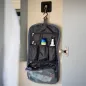 Preview: Washbag Kulturbeutel faltbar blau in der Hand