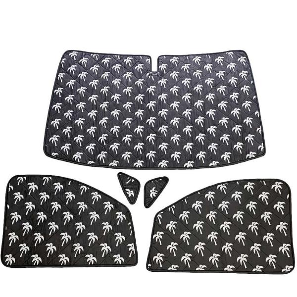 Thermomatte Fahrerhaus mit schwarzer Außenseite und weißen Palmen