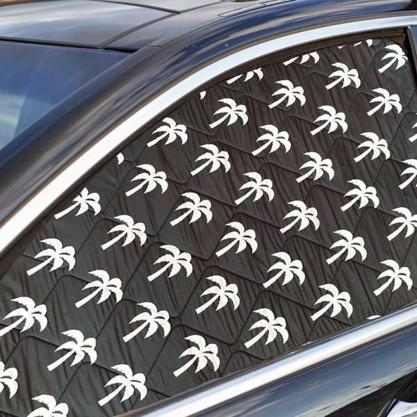 Thermomatte Fahrerseite mit schwarzer Außenseite und weißen Palmen